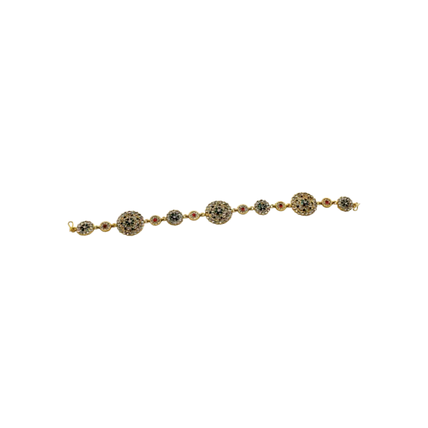GGraceful Gold Matapati Adorned with Multicolored Stones